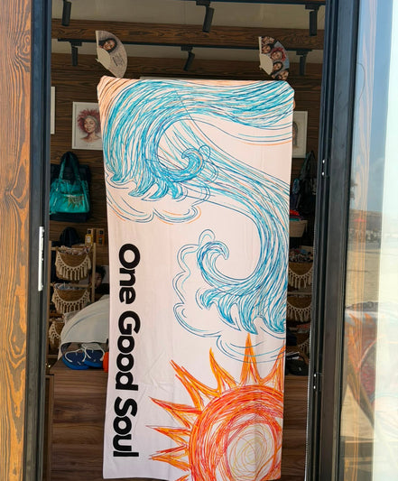 The wave  Beach Towel